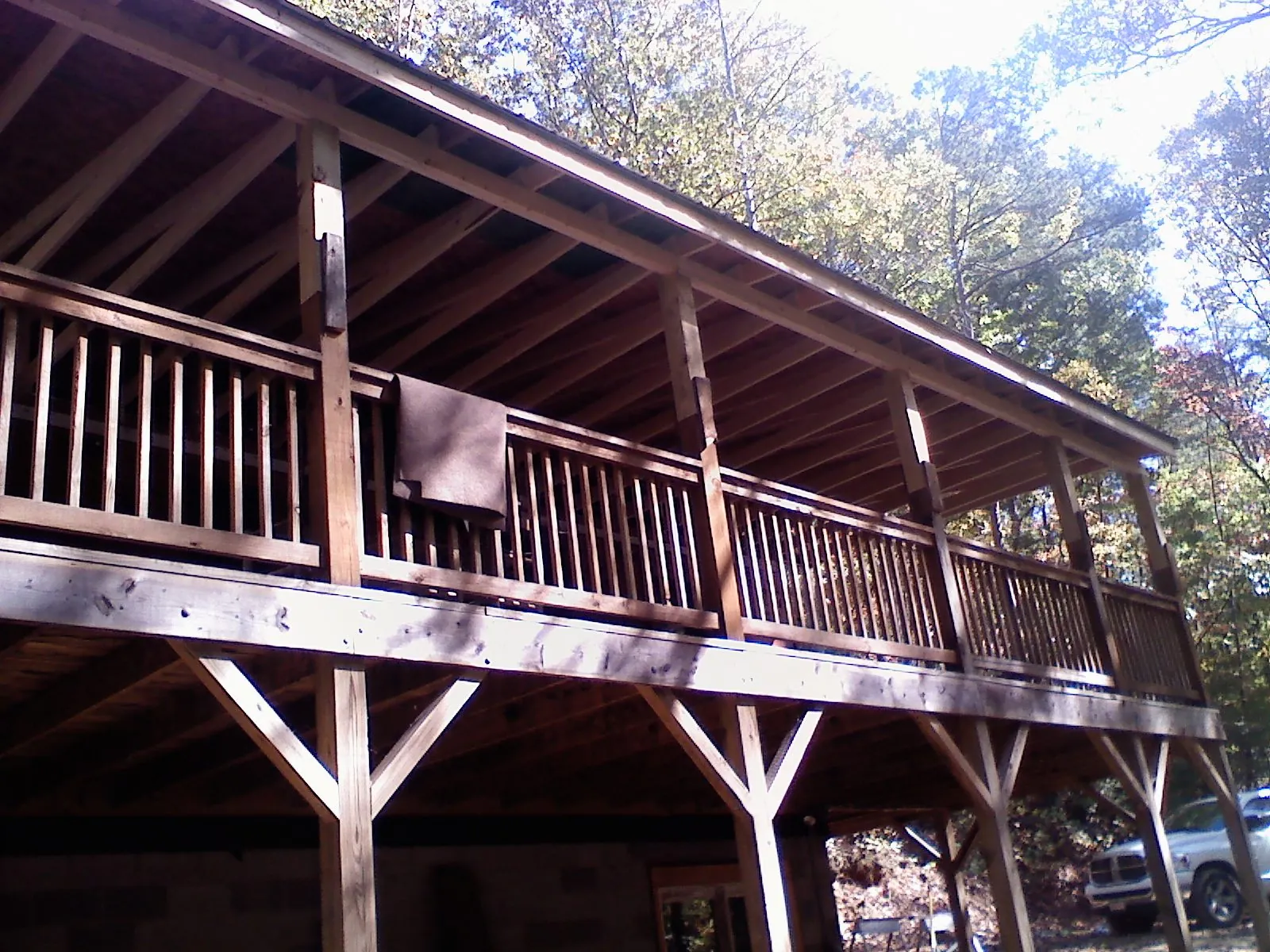 Timber framing under a new elevated porch and deck — Roof Leak Repair in Newborn by Roofing Brothers